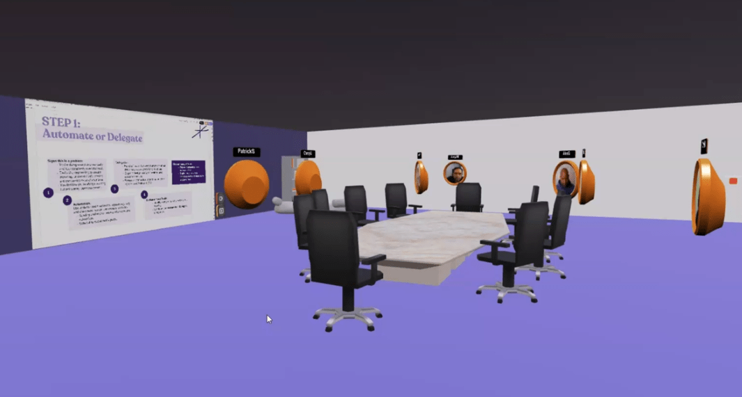 A 3D virtual conference room with a team of circular avatars around a conference table, looking at a presentation on the wall