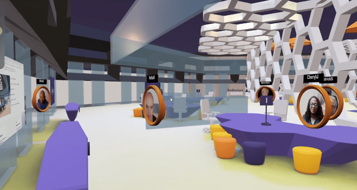 3D virtual office shared meeting area with people in live video circular avatars around a meeting table watching a presentation