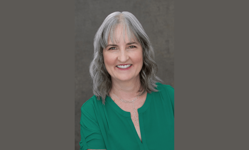 Picture of Candy Messer wearing a green shirt