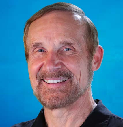 Headshot of Leaonard  Szymczak - male with brown goatee smiling