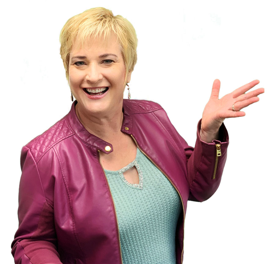 Headshot of Michelle Calloway- woman with blonde hair wearing purple jacket with a teal blouse