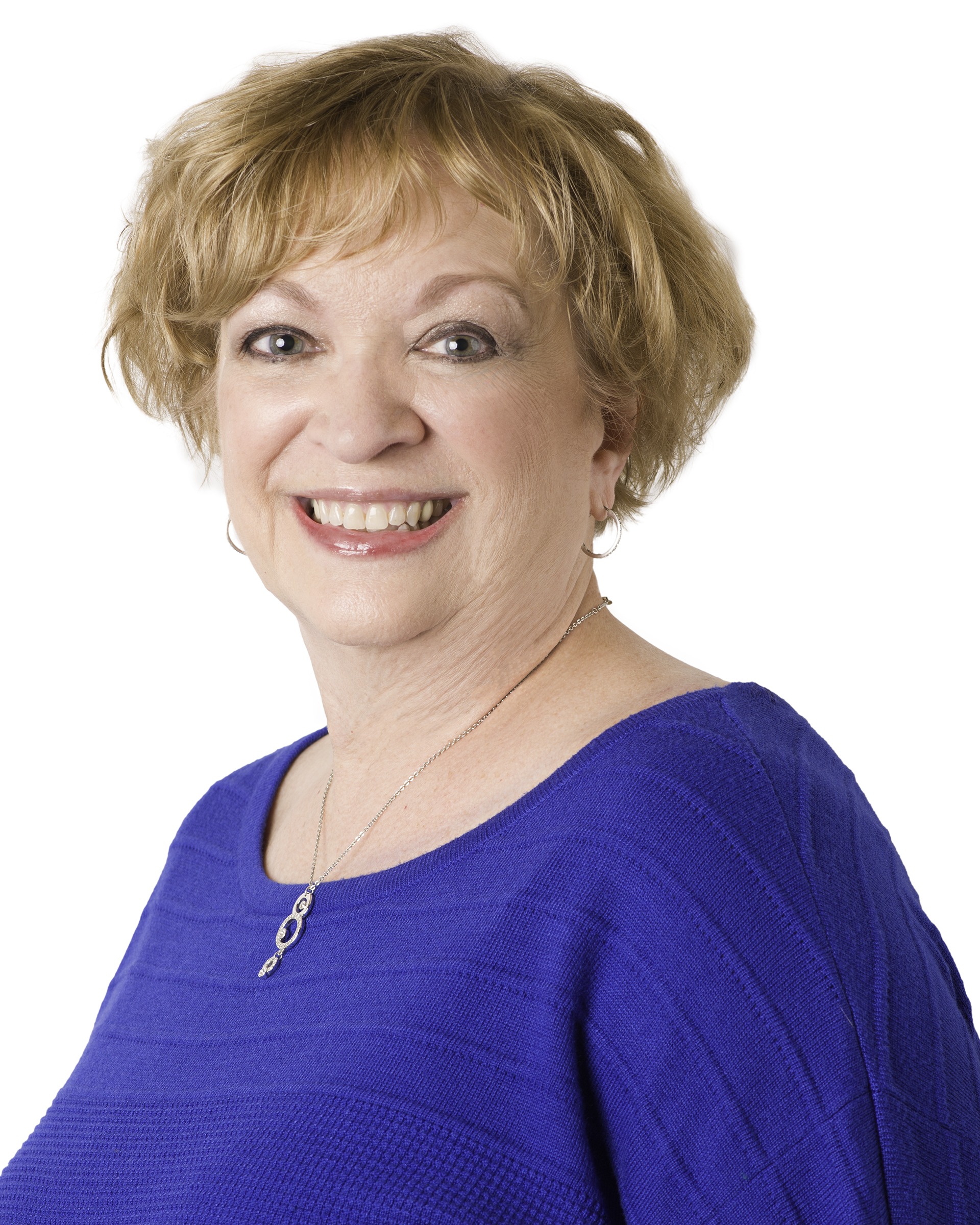 Headshot of Patricia Stepler - woman with short blonde hair wearing a blue shirt smiling
