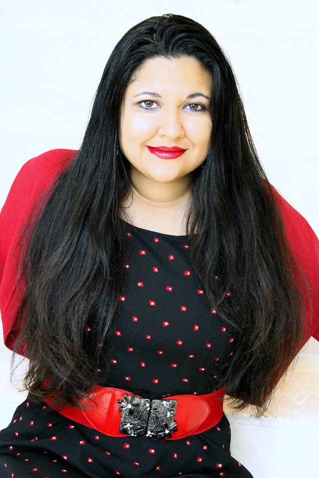 Sophia Olivas in black and red dress