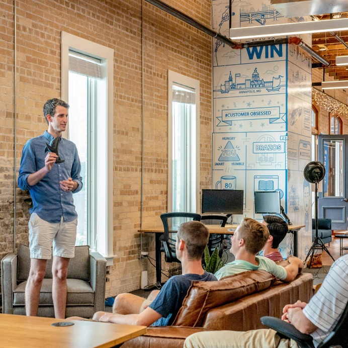 person presenting to a team
