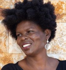 Headshot of Chantay Jennings - woman looking to her right smiling