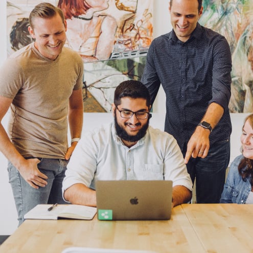 Team working on solutions for a small business